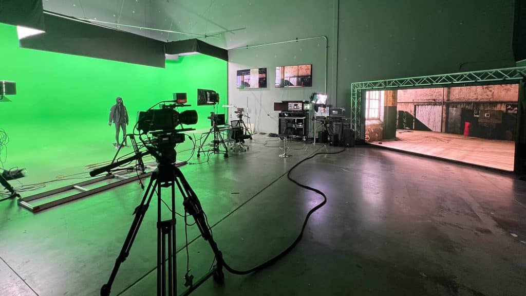 Hybrid virtual production stage with green screen and LED wall
